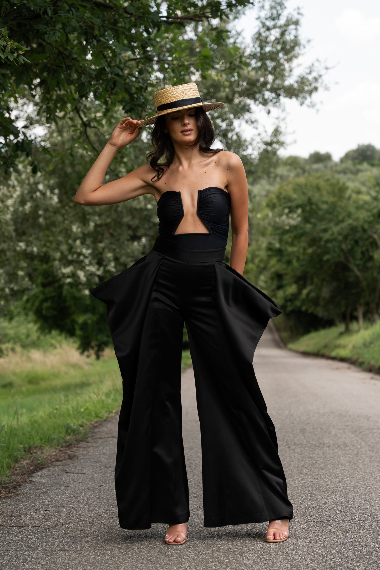 A woman in Nayades the Label's Coco de Terre Trousers Black in tuscany.